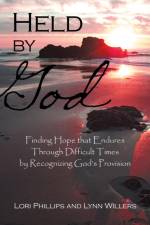 Held by God af Lori Phillips