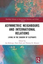 Asymmetric Neighbors and International Relations