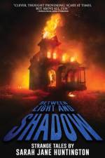 Between Light And Shadow af Velox Books