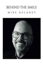 Behind The Smile af Mike Delaney
